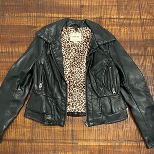 CHEROKEE GIRLS FAUX LEATHER JACKET W/RUFFLE DETAIL
